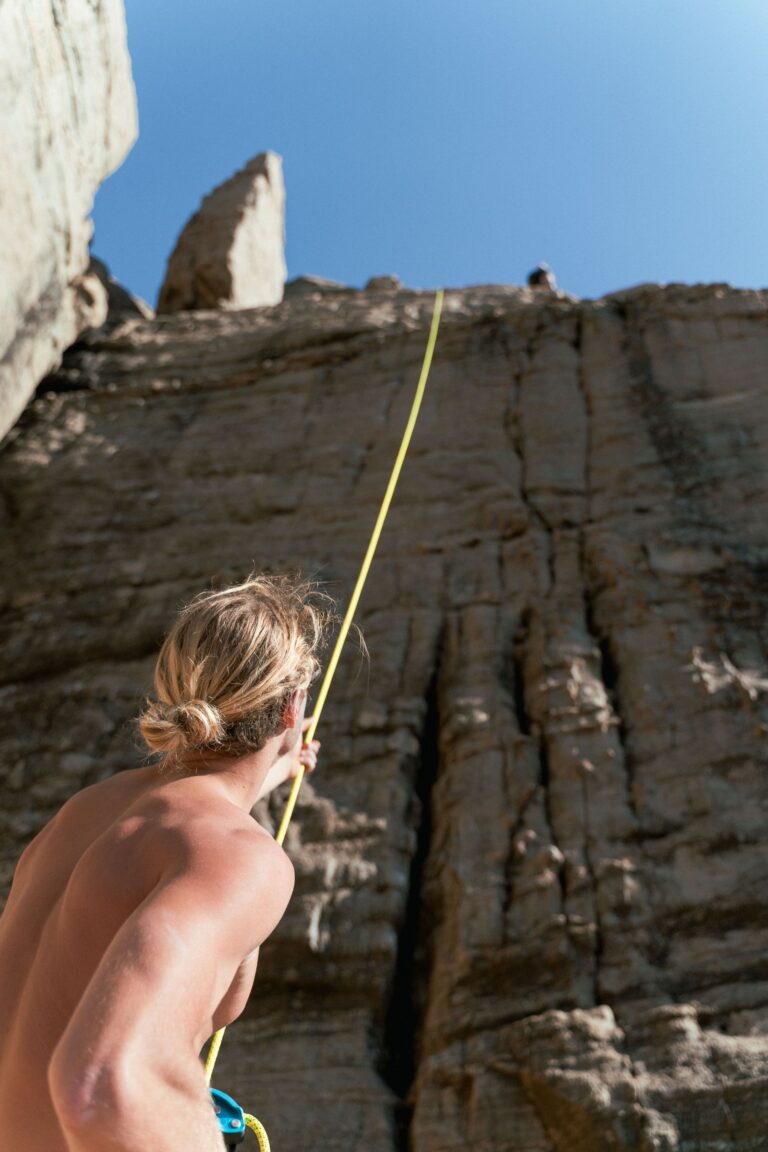 Photo by Liam Moore: https://www.pexels.com/photo/man-holding-climbing-rope-at-the-foot-of-a-rock-face-10867135/