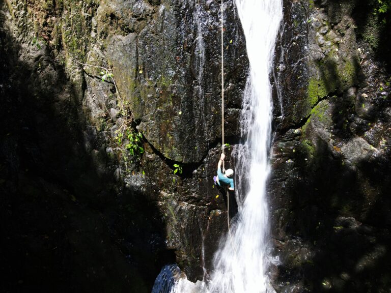 Abseiling down a waterfall