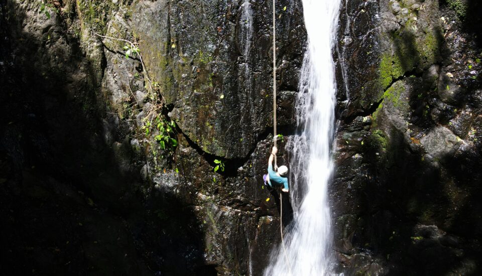 Abseiling down a waterfall