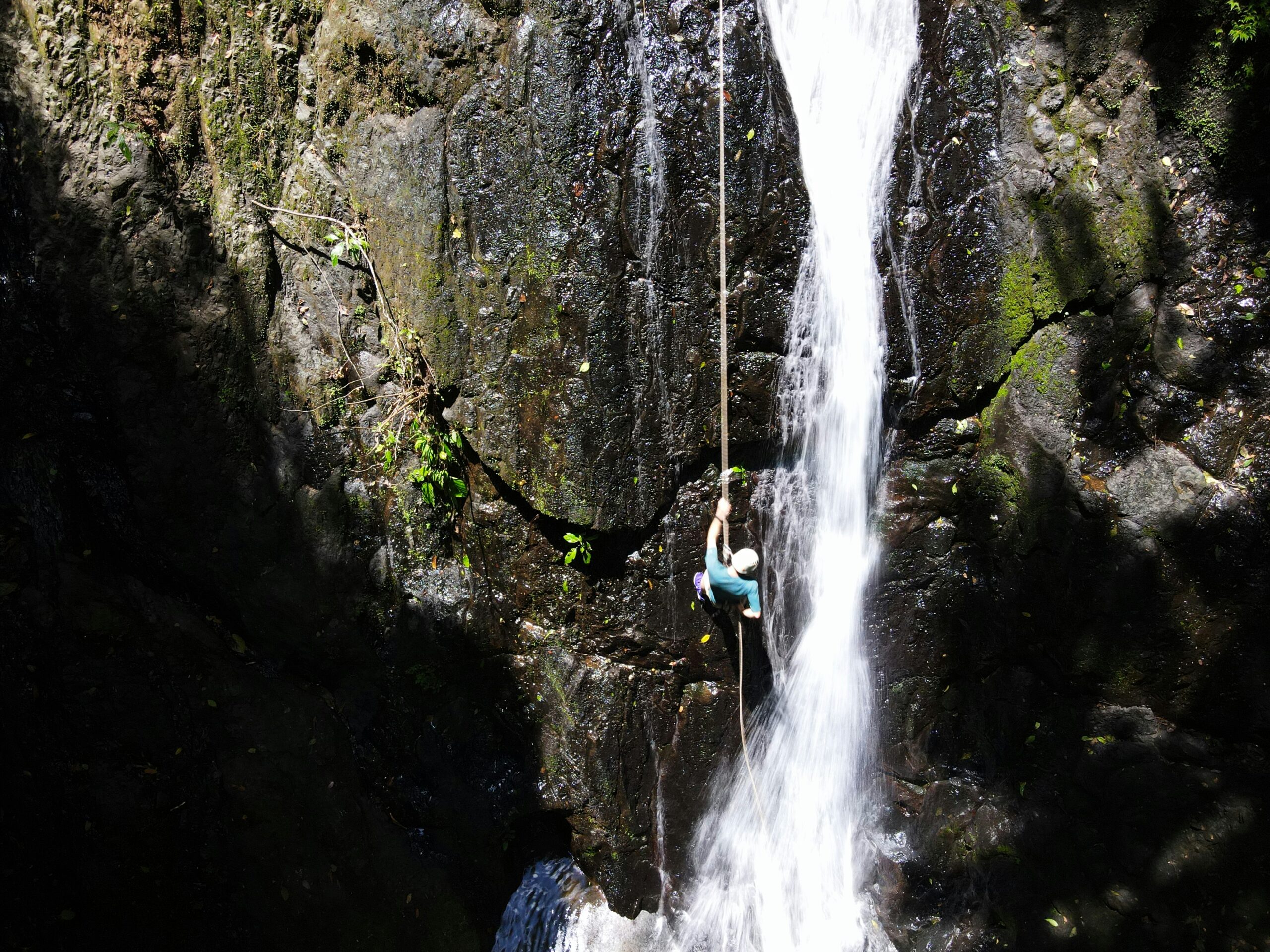 Abseiling down a waterfall