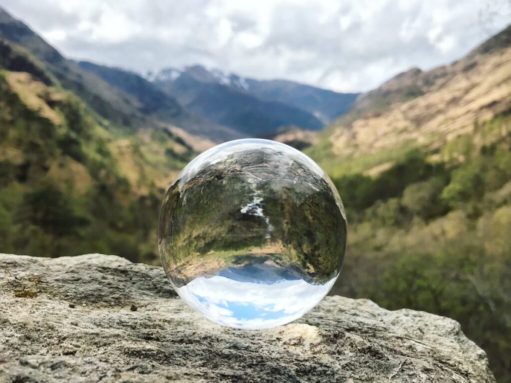 Lens ball with a view over mountains