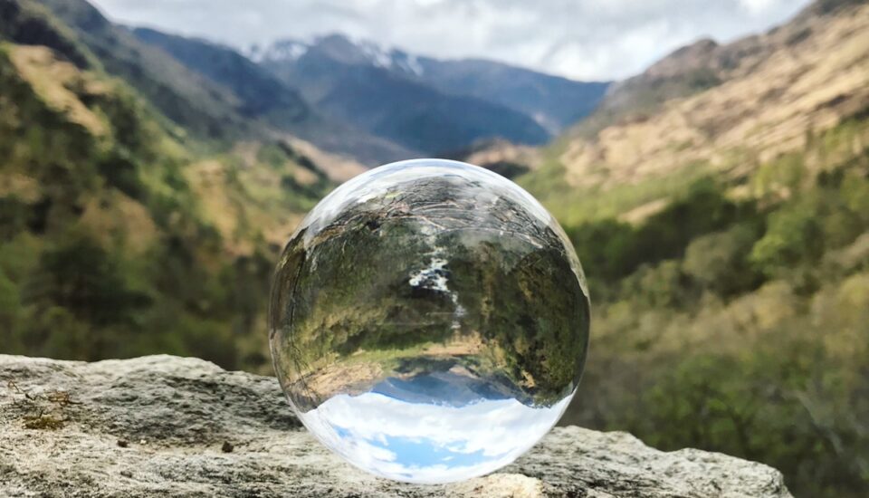 Lens ball with a view over mountains
